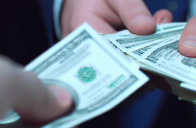 dalle_2023-05-10_19.01.56_-_corrupt_transfer_of_money_from_hand_to_hand_hyper_realistic_hands_in_suits_super_high_res_8k.png